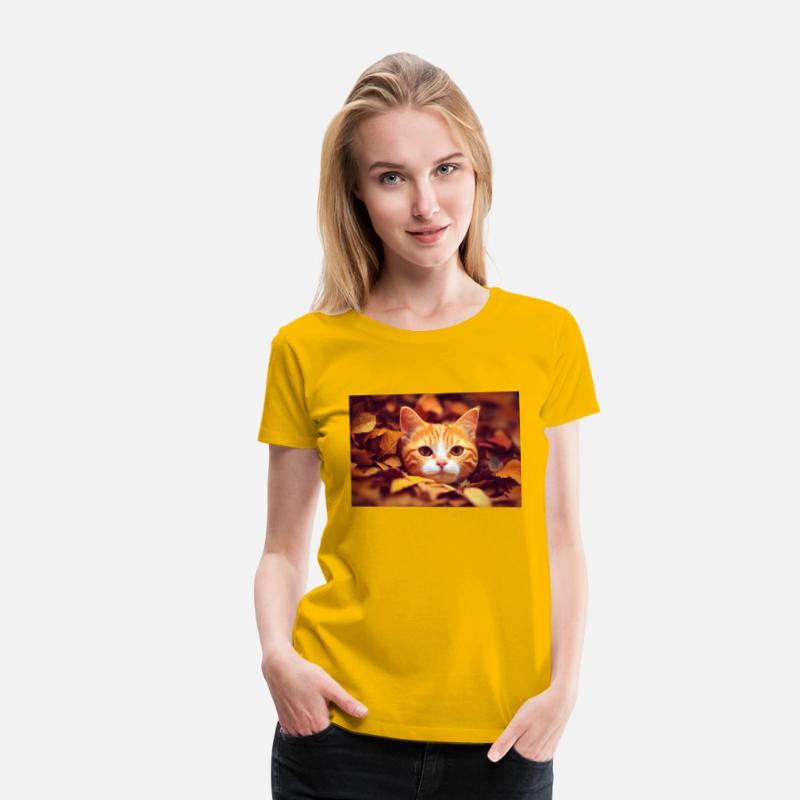 Cat orange and white cat laying a pile of leave